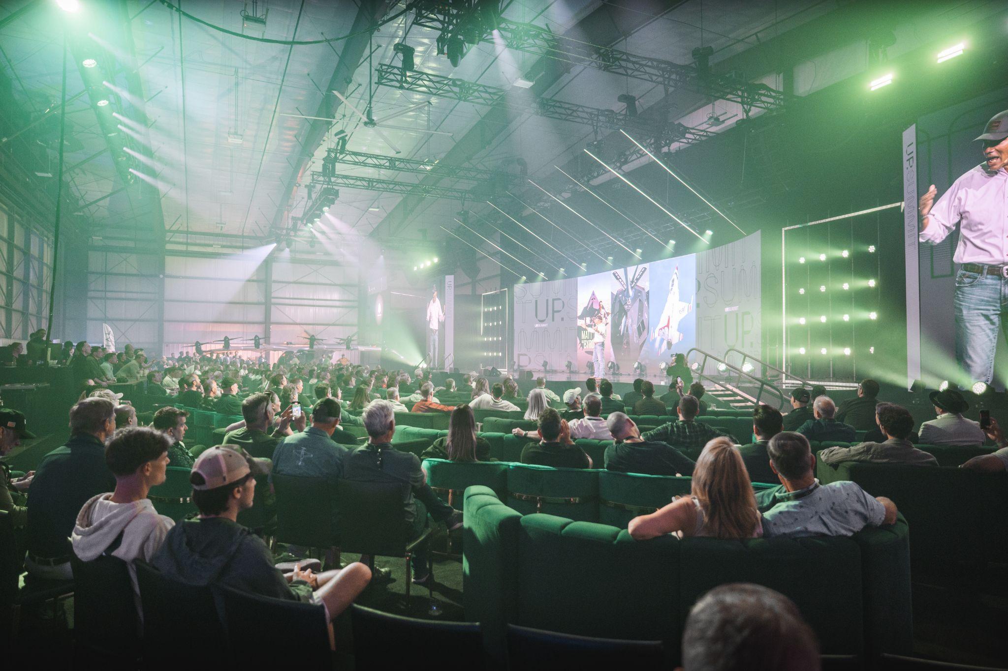 UP.Summit branded stage and event environment